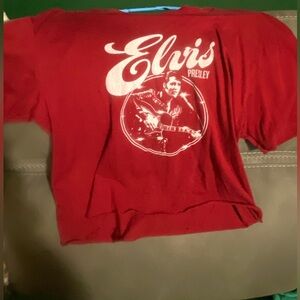 Women’s Elvis t-shirt, not a crop top but shorter than a regular t-shirt.